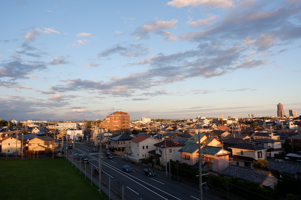 a view of a city from the top of a hill