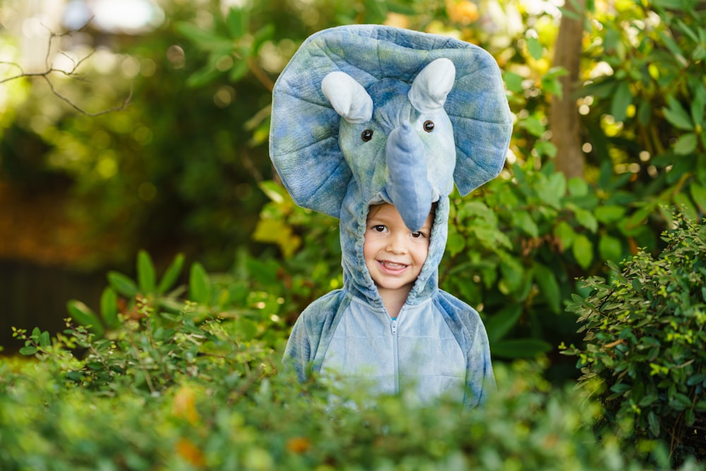 toddler on blue elephant costume