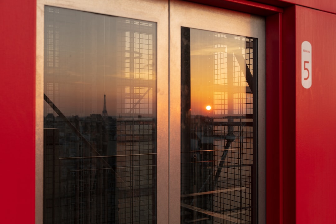 grey-framed glass door