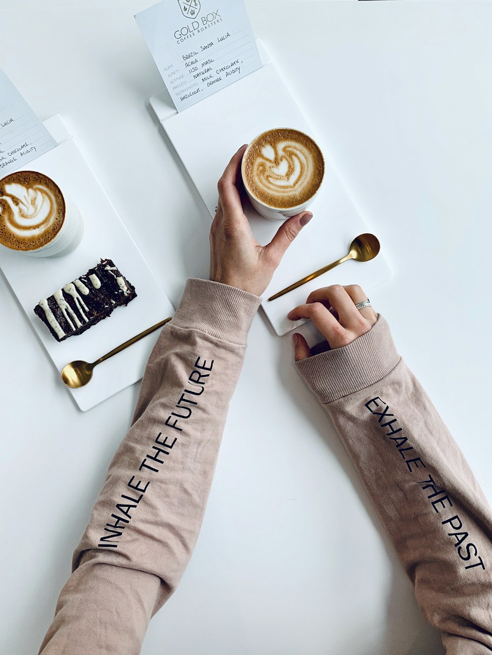 person holding coffee cup