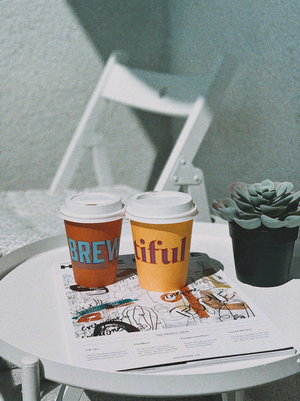 two tumblers on desk