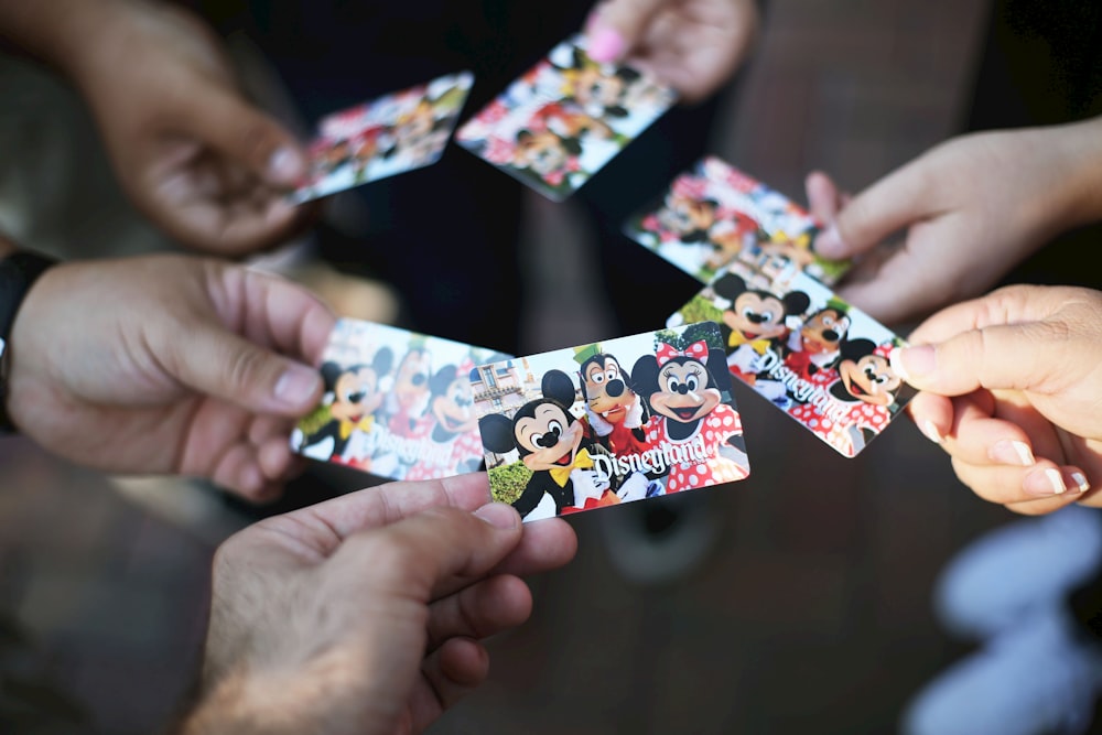 shallow focus photo of Disneyland cards