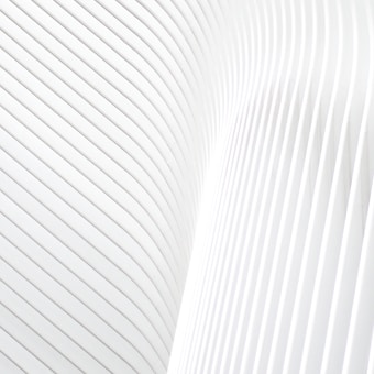 a close up of a white wall with wavy lines