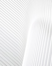 a close up of a white wall with wavy lines
