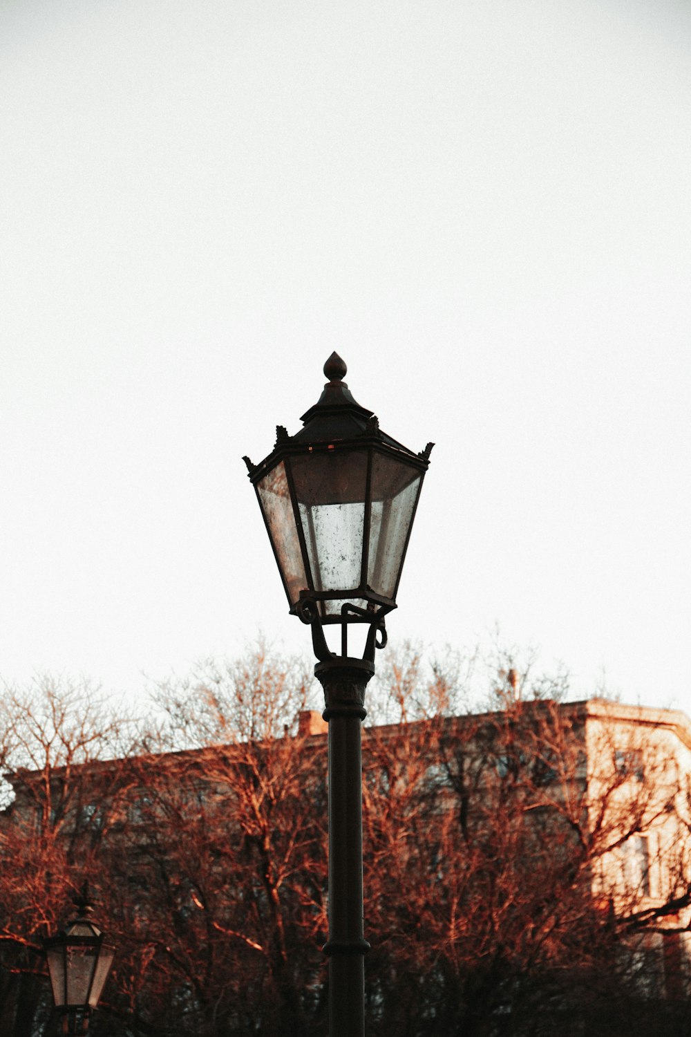 black street light near building