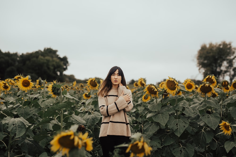 woman in sunflower field