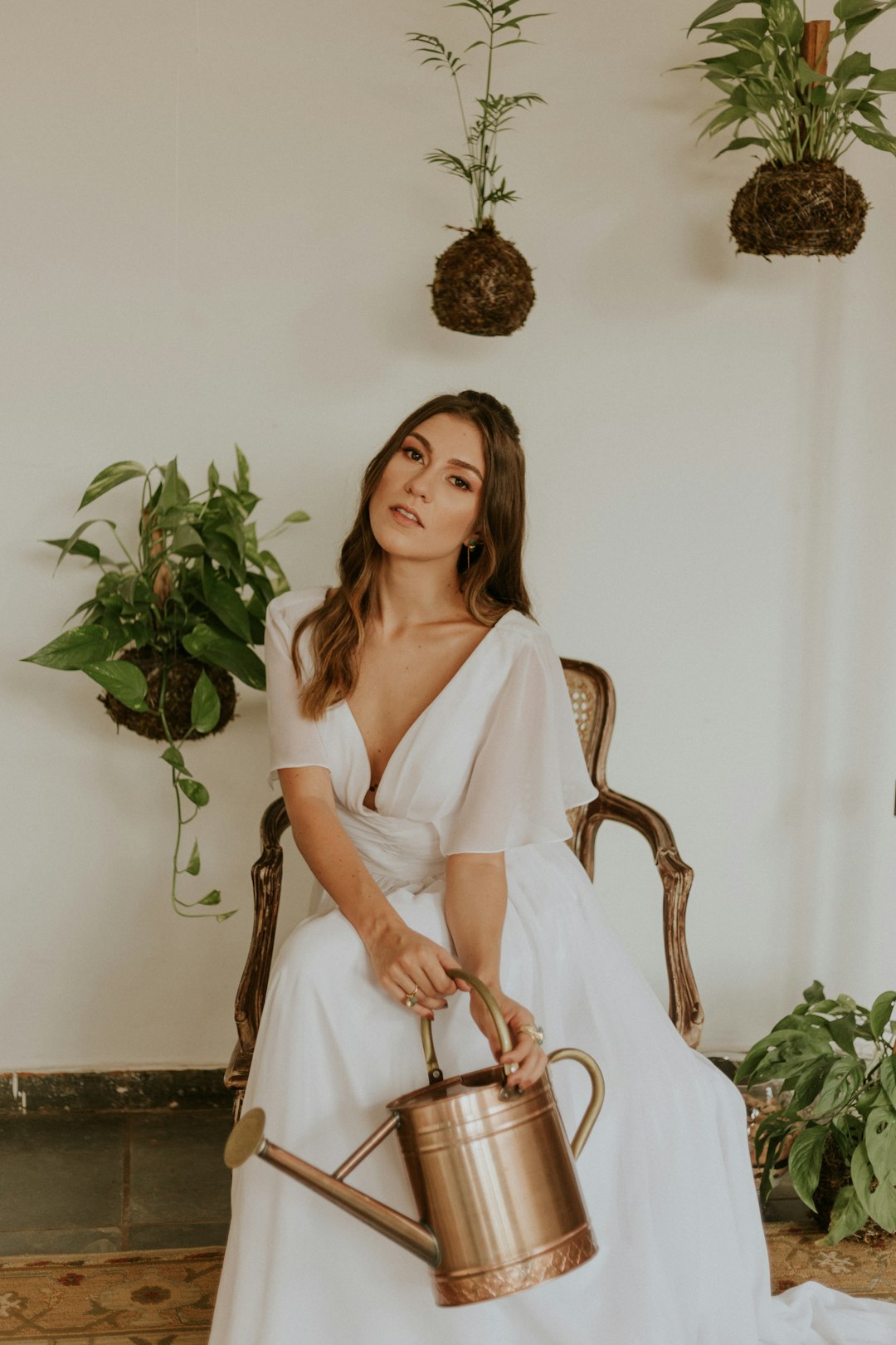 woman holding watering can