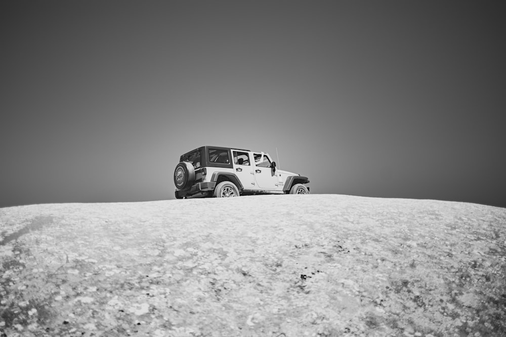 grayscale photography of SUV