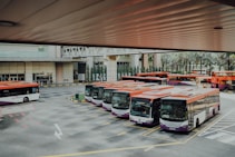 orange and white bus lot
