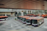 orange and white bus lot
