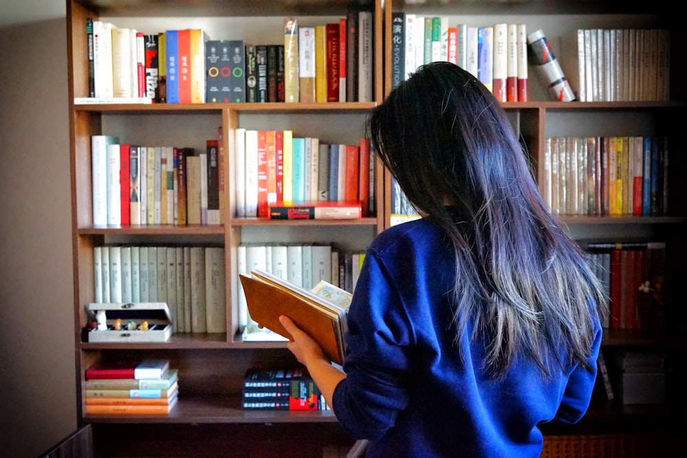 woman reading book