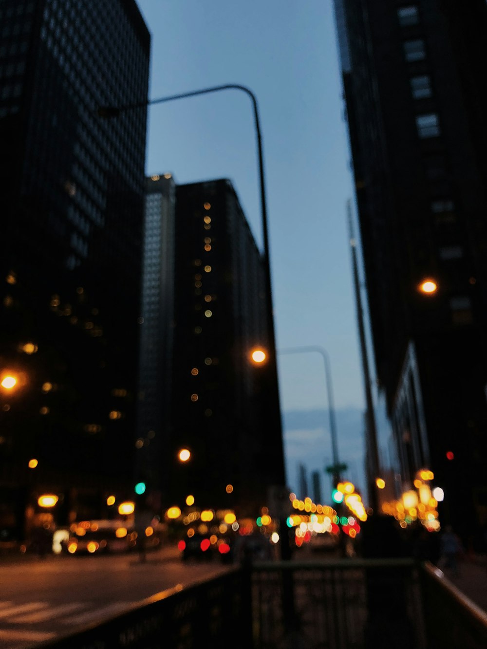 bokeh photography of road at night