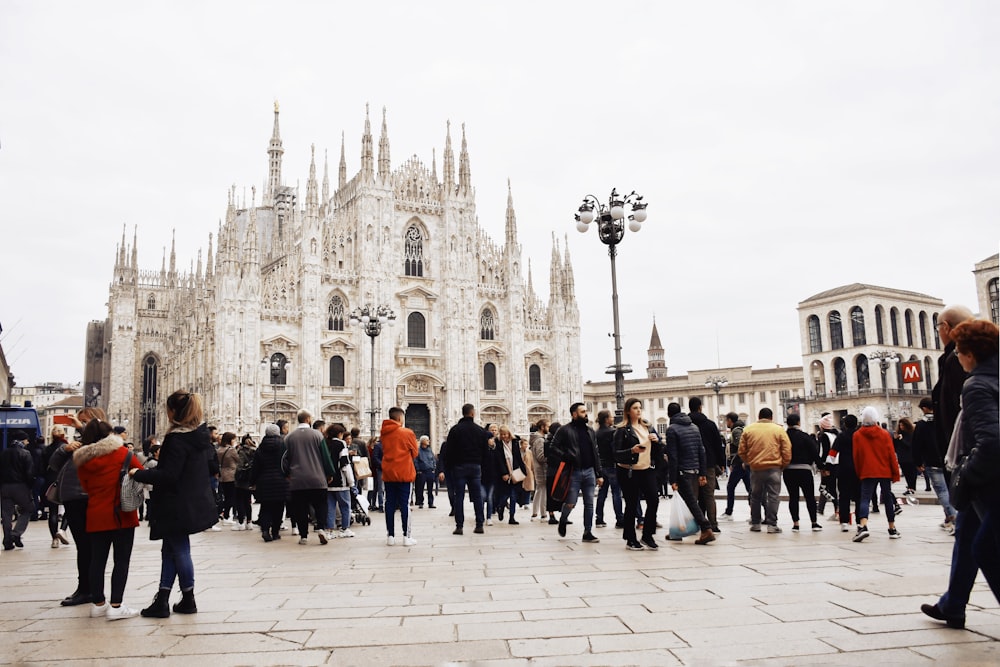 people walking near Milan Cathedral in Italy during daytime