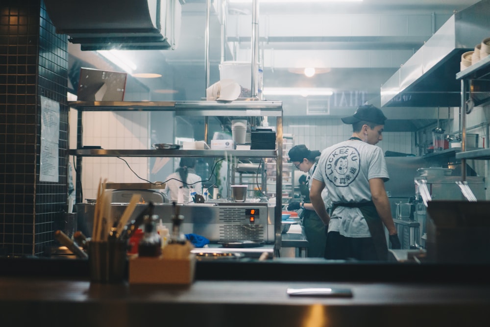 restaurant crews cooking inside kitchen