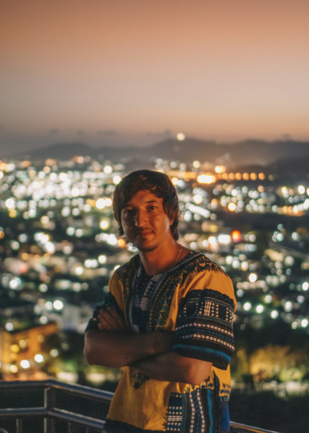 man on top of building