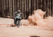Yamaha rider wearing protective gear on a dirt road