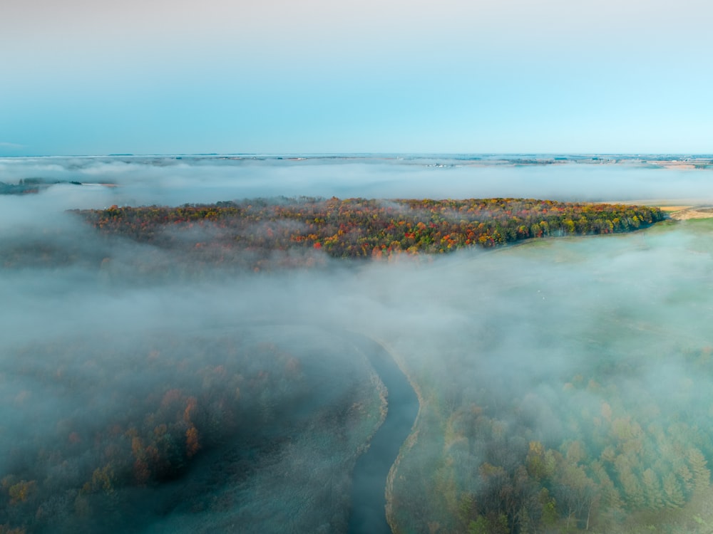 island under white clouds