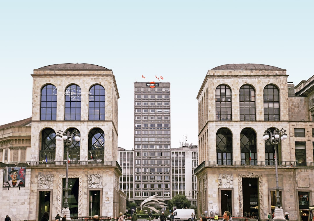 brown concrete buildings under blue sky