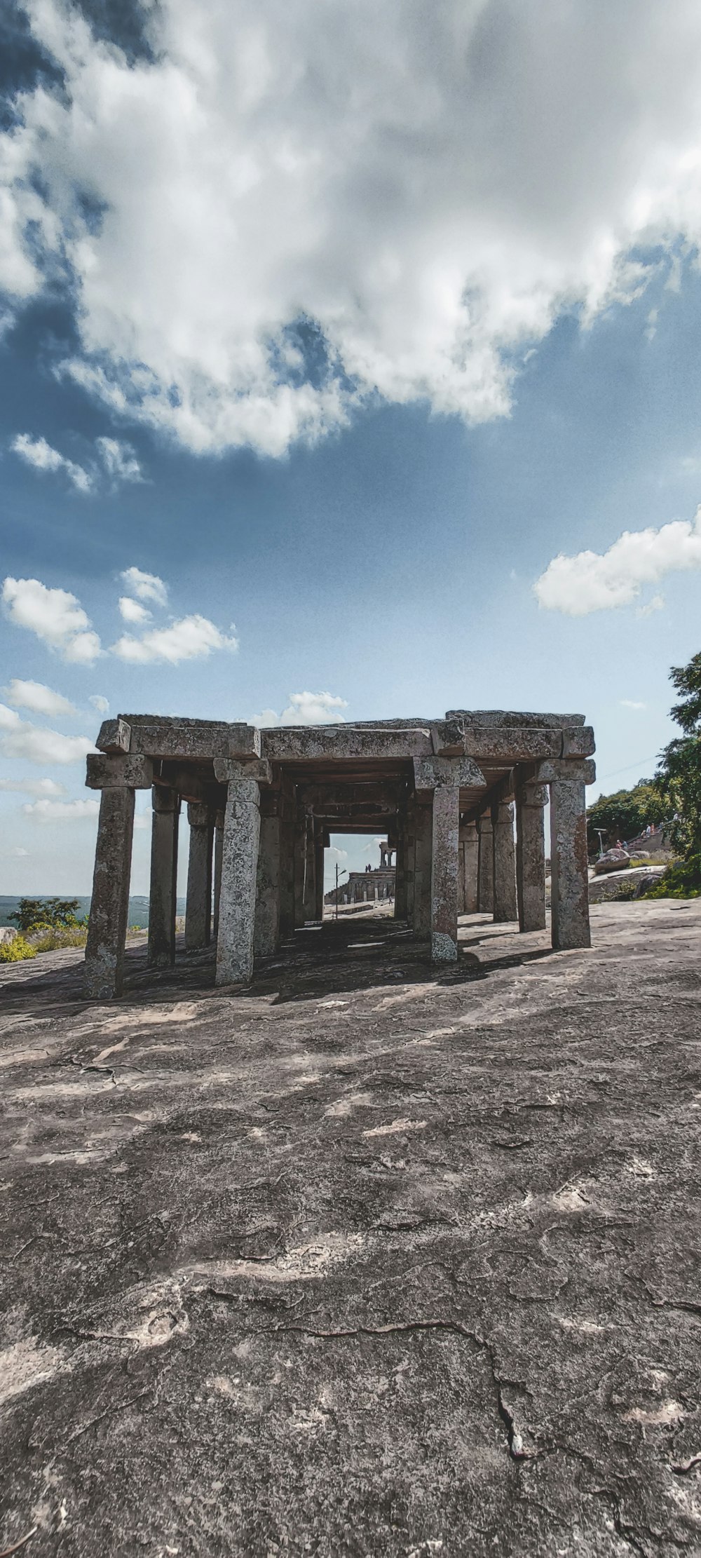 gray concrete building ruins under a cloudy sky