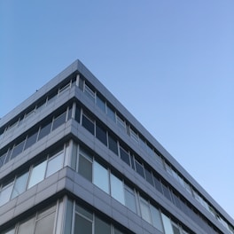 low-angle photography of gray concrete building