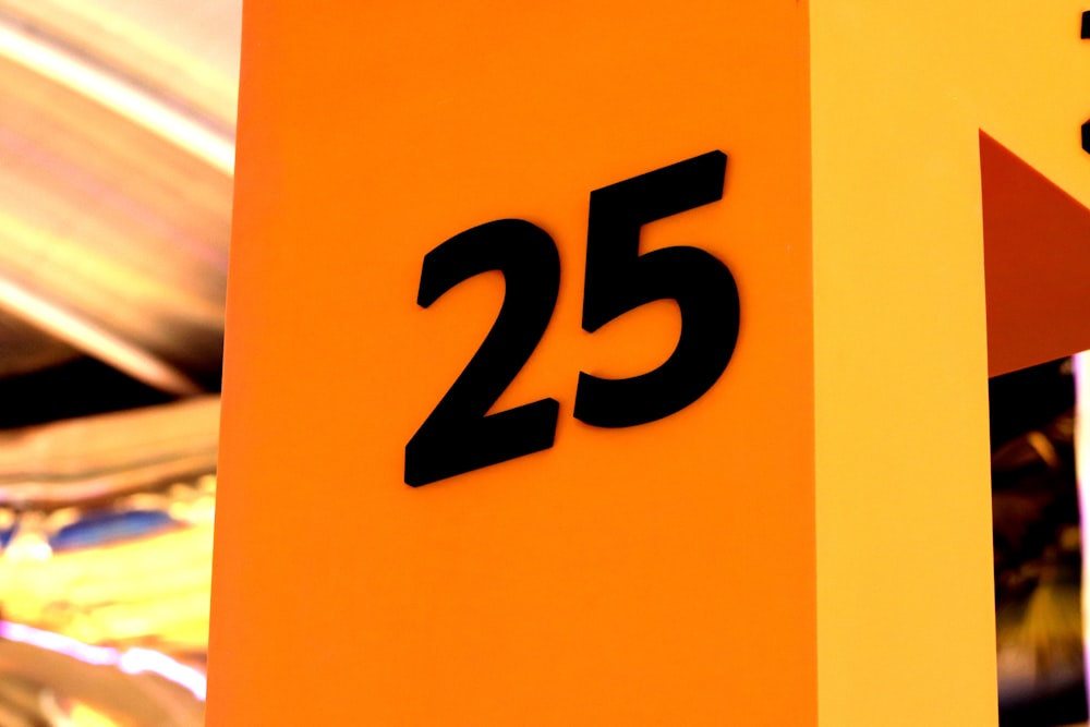 orange and black 25 number illustration