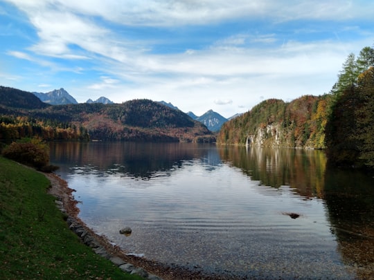 lake near hills at daytime in Museum of the Bavarian kings Germany