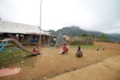 Children playing in the village playground.