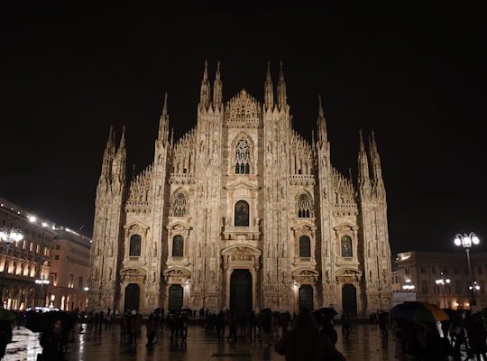 brown concrete building in Duomo di Milano Italy