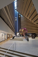 Panoramic view of the exhibition space blending artistic and scientific elements.