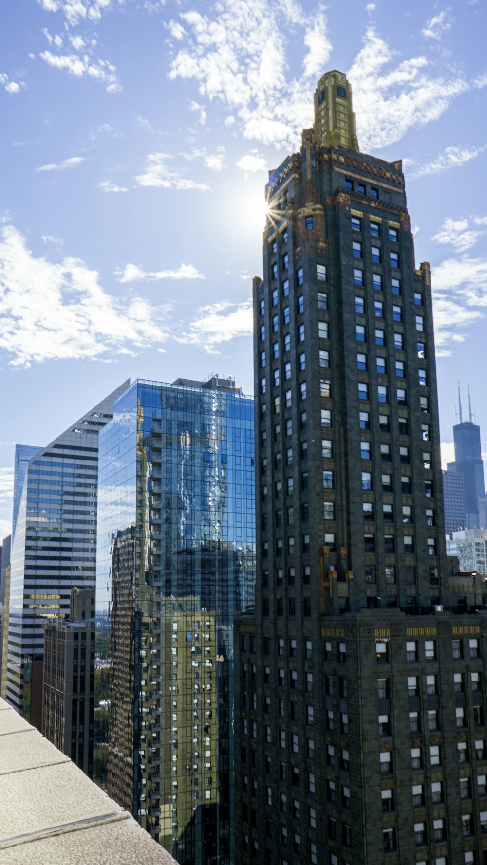 high-rise building under cloudy sky