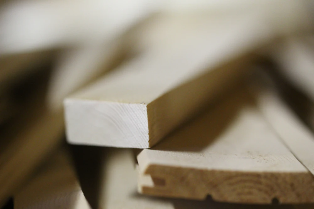 Macro of a machined panel edge showing the joint and the grain. Stock image, placeholder.