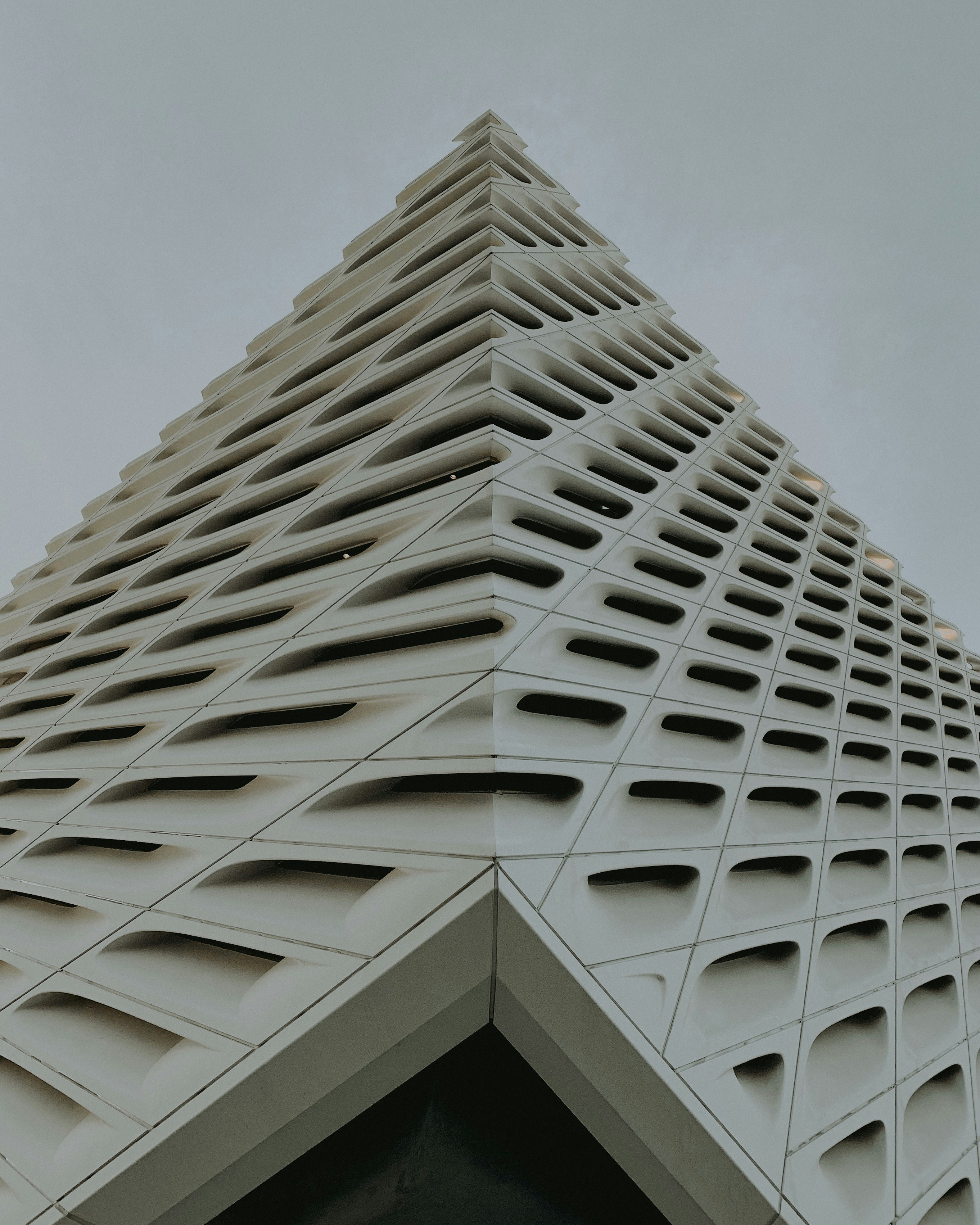 low angle photo of white painted concrete building