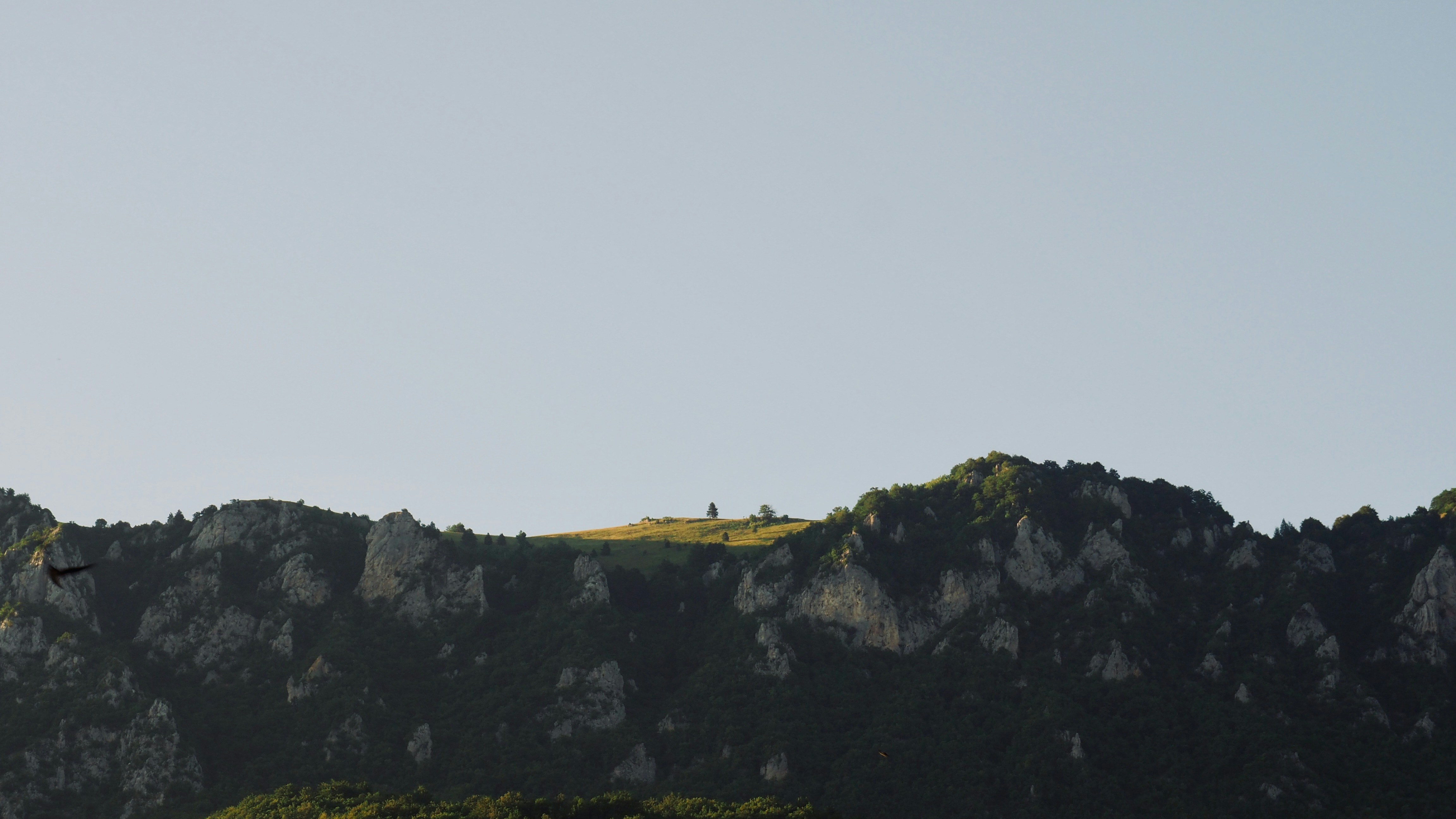 black rocks under grey sky bosnia and herzegovina zoom background