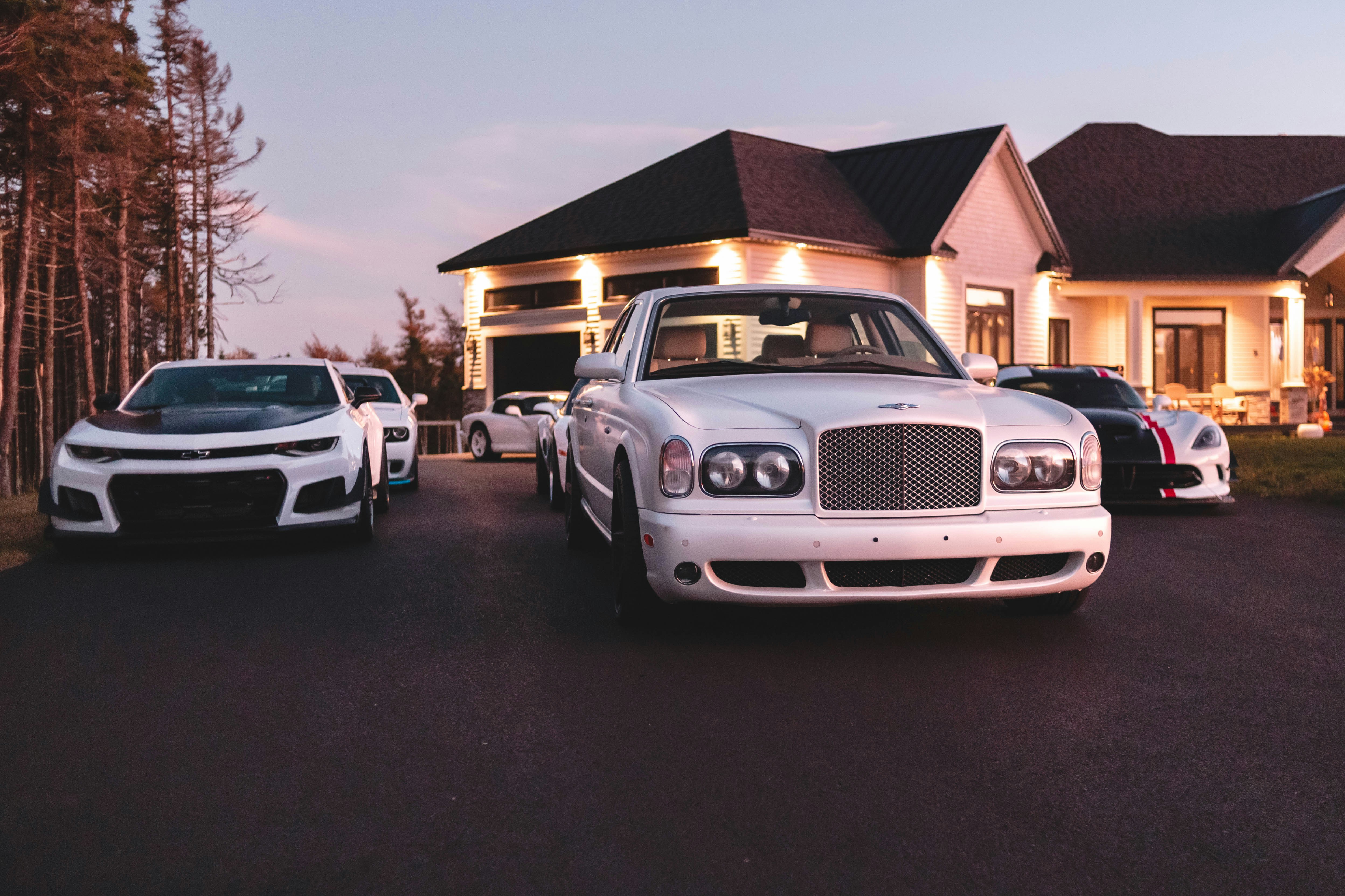White car on paved road