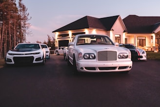white car on paved road