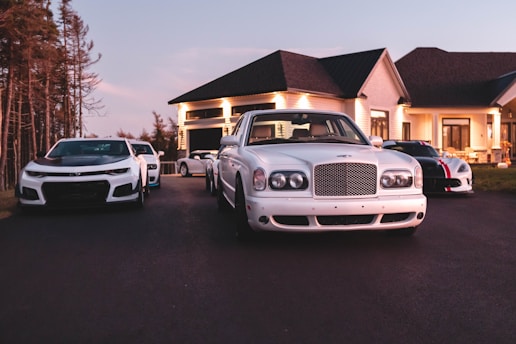 white car on paved road