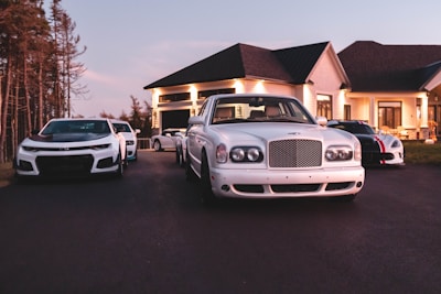 white car on paved road