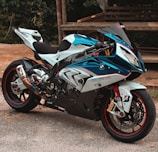blue and white BMW sports bike