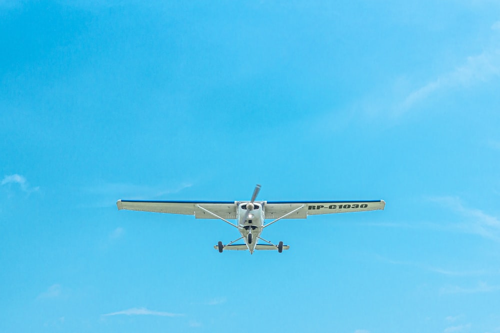 white monoplane on flight