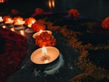 A peaceful corner with candles, mandala art, and soft golden light creating a warm, inviting atmosphere.