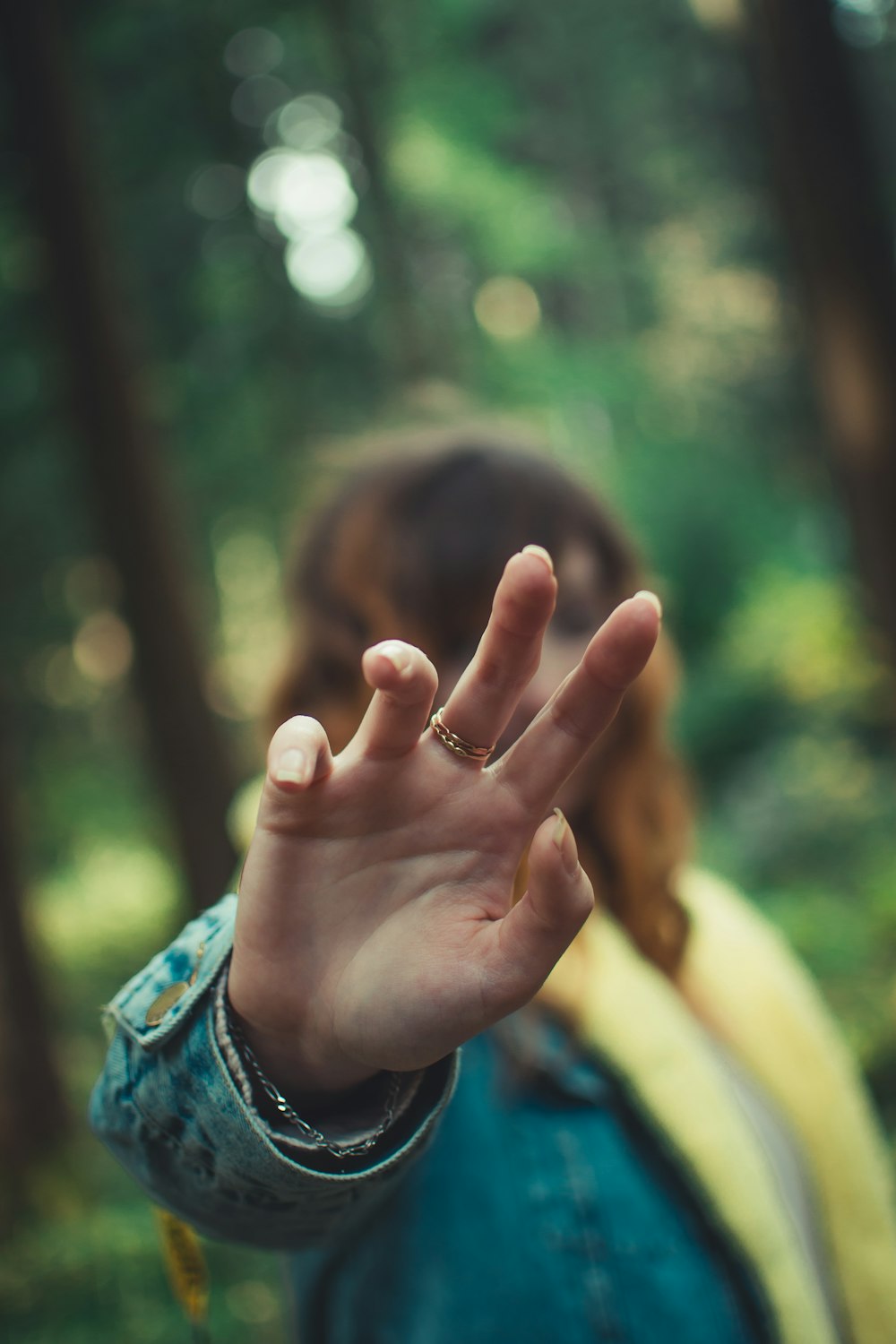 a woman making the vulcan sign with her hand