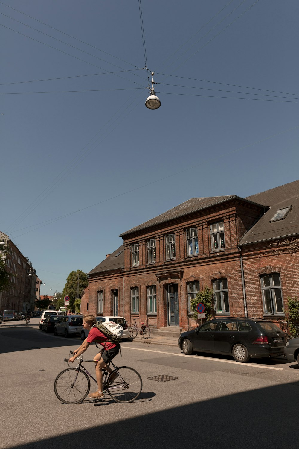 man riding bicycle on the street