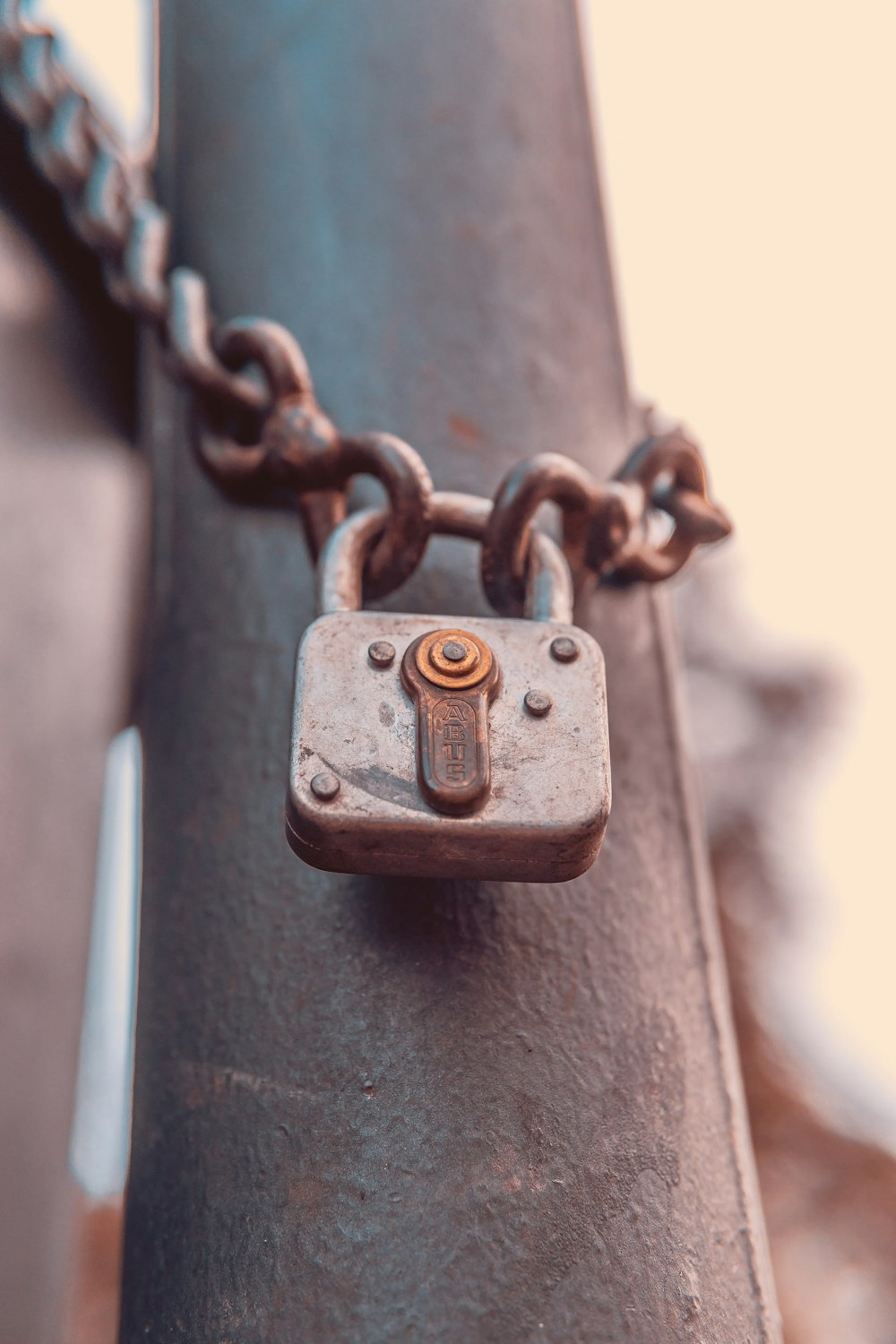 gray padlock in chain