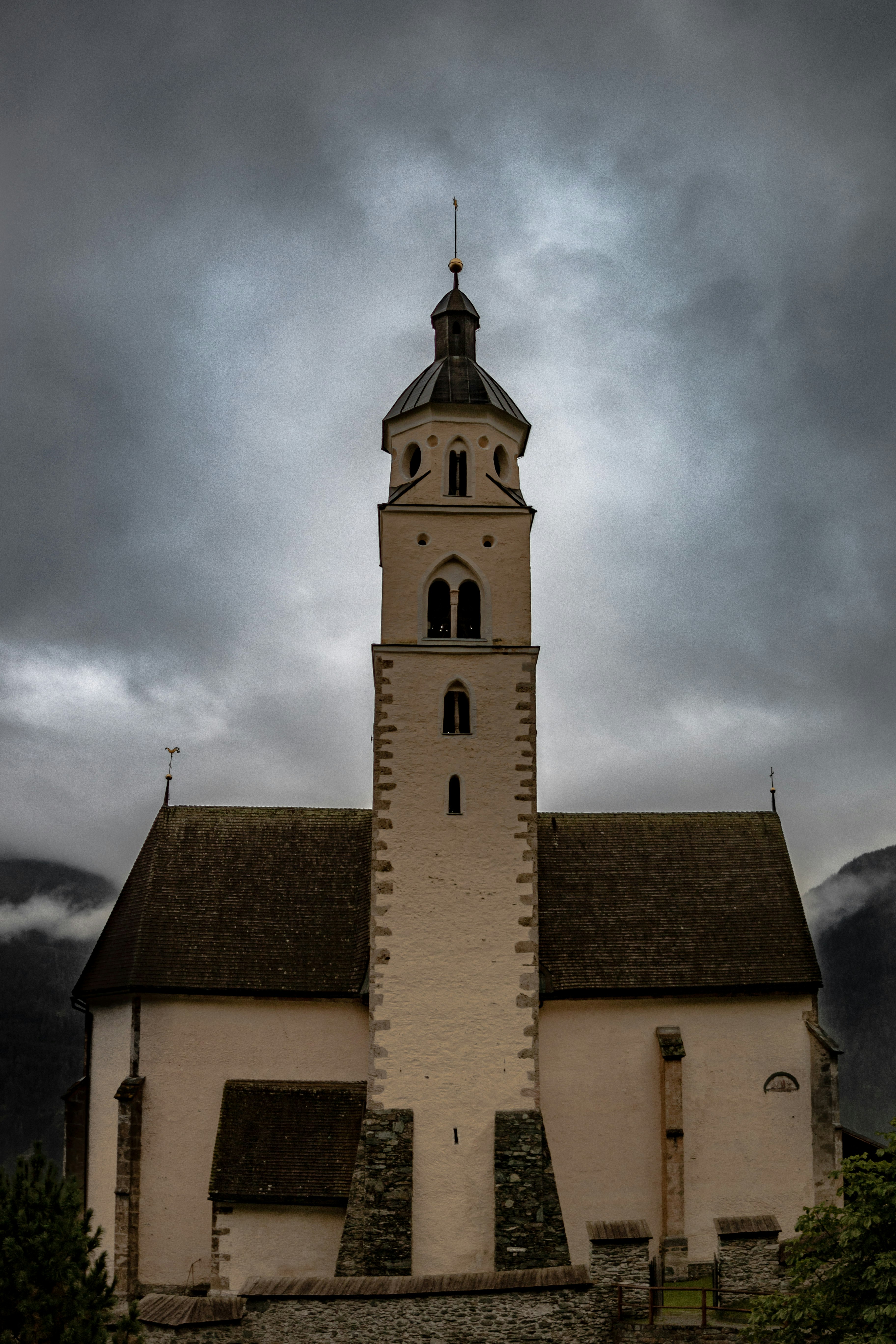 beige and brown concrete building with tower