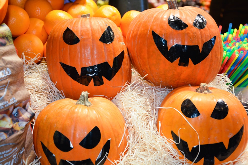 four painted Halloween pumpkins