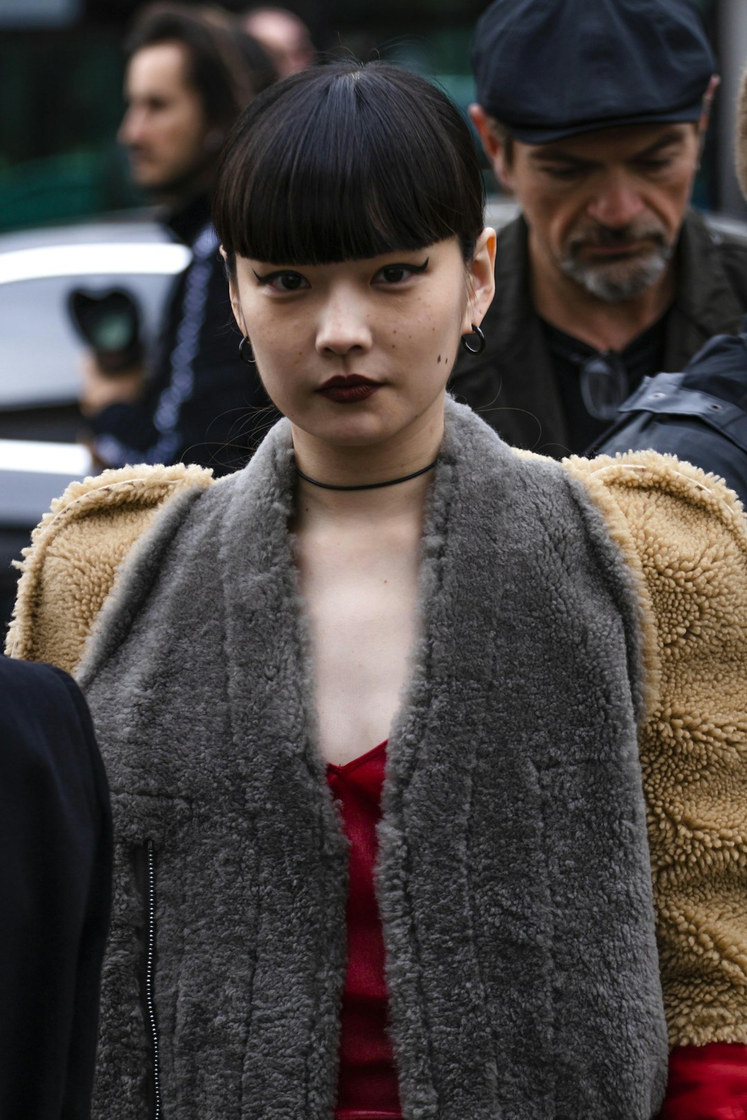 woman in a brown and gray furry jacket