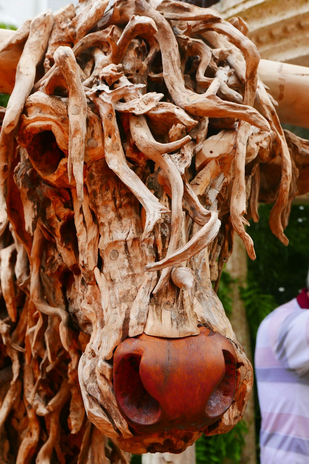 brown wooden statue of a bull