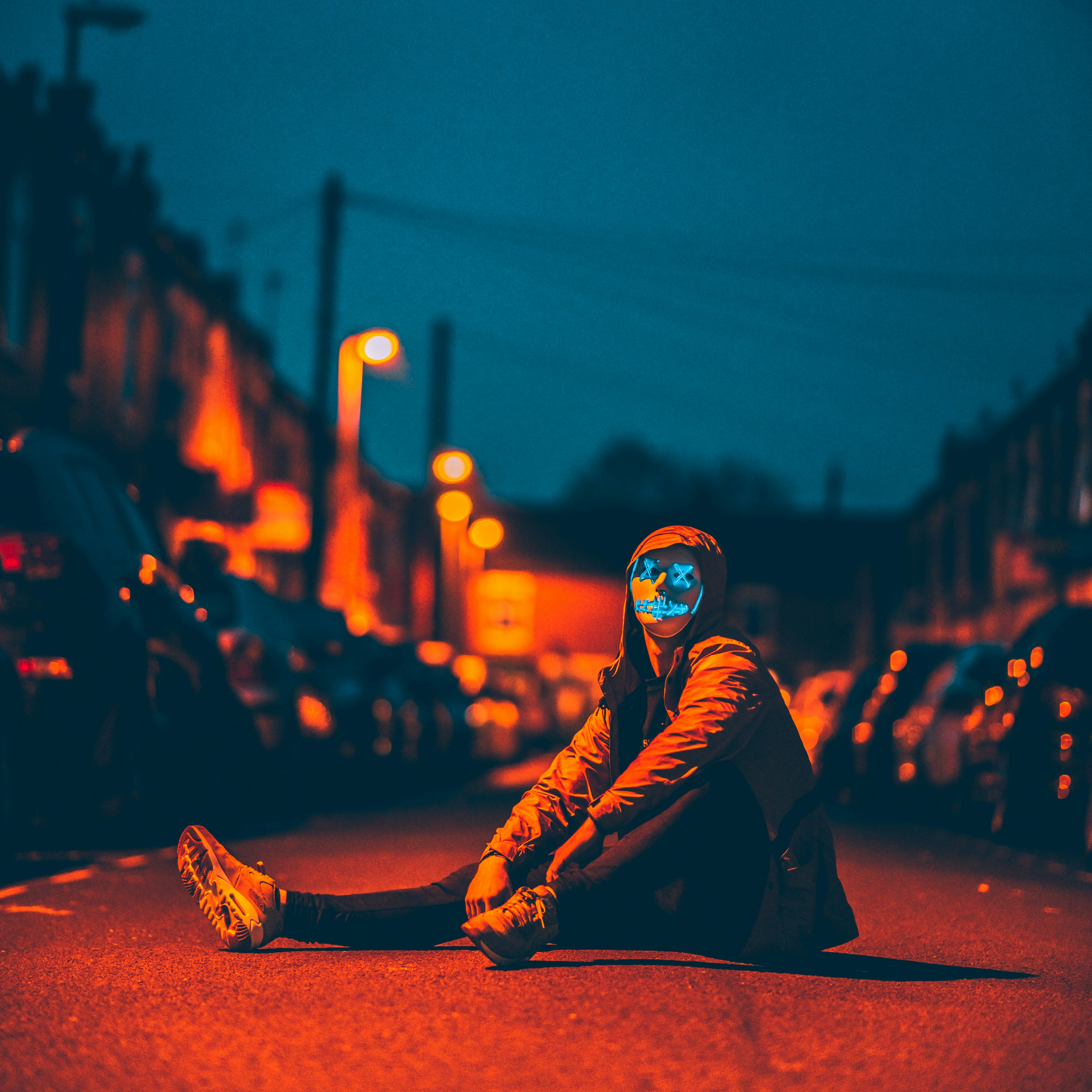person sitting on road