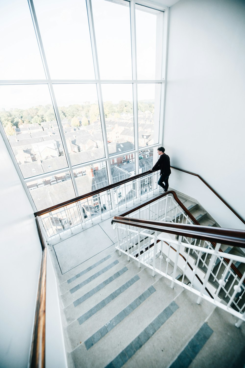 man standing on stairs