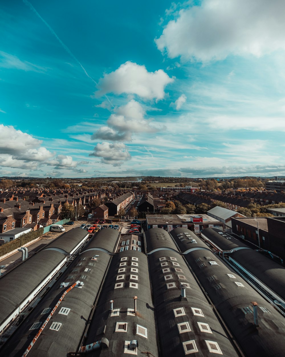 houses under blue and white sky